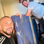 CarePhilly Movers Employees moving a pool table